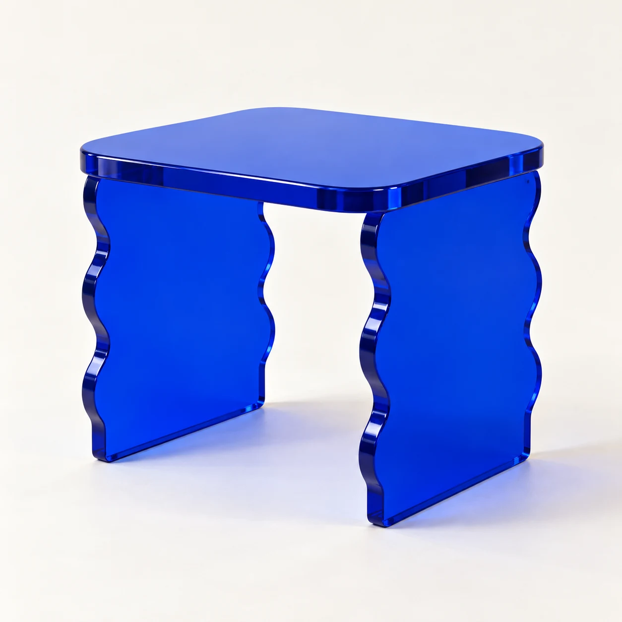 Cobalt Ripple Cobalt blue acrylic stool, three-quarter view
