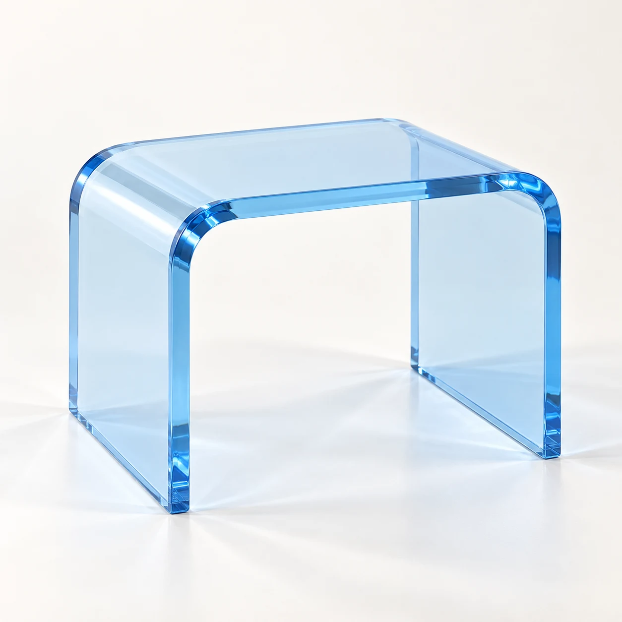 Ice Loop Ice blue acrylic stool, three-quarter view